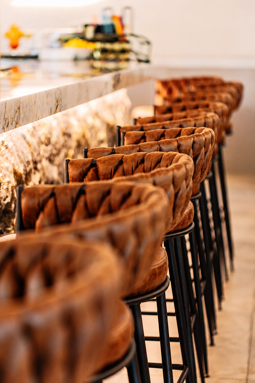 Modern bar stools in ambient lighting